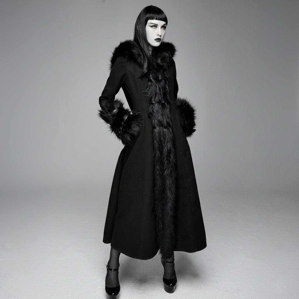 Black coat with fur trim worn by a model on a gray background