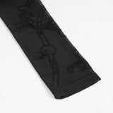 Legging gothique imprimé 'Across The Ocean' avec chaîne